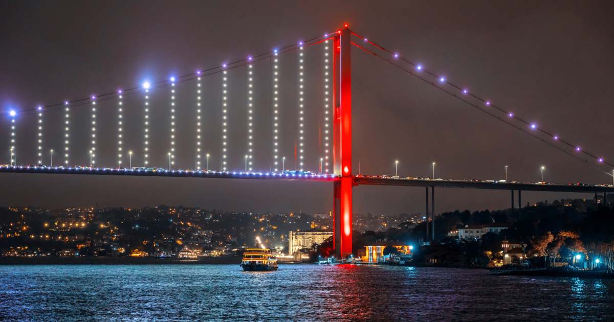 bosphorous bridge on istanbul with red lights on